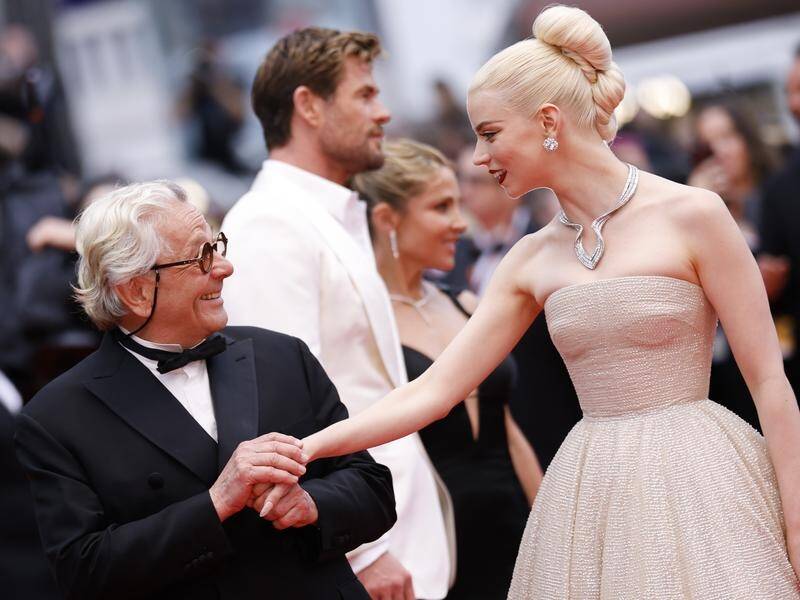 George Miller and Anya Taylor-Joy hit the red carpet for the premiere of Furiosa in Cannes. (AP PHOTO)