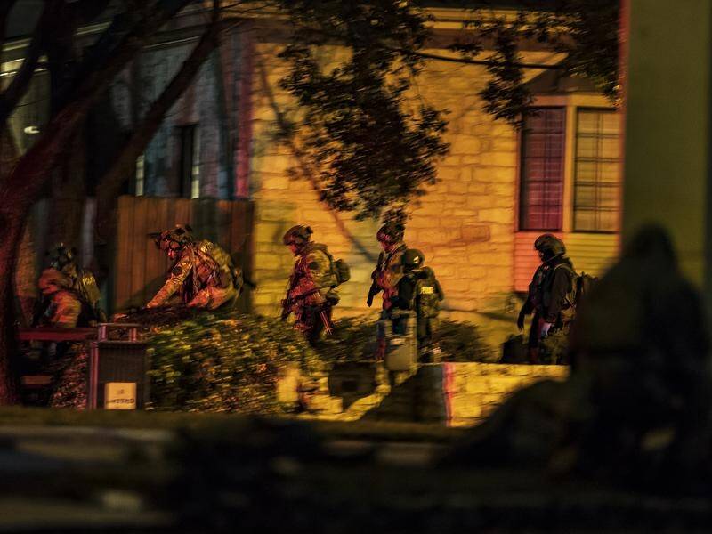 Police entered a building in Austin, Texas, after a reported hostage situation.