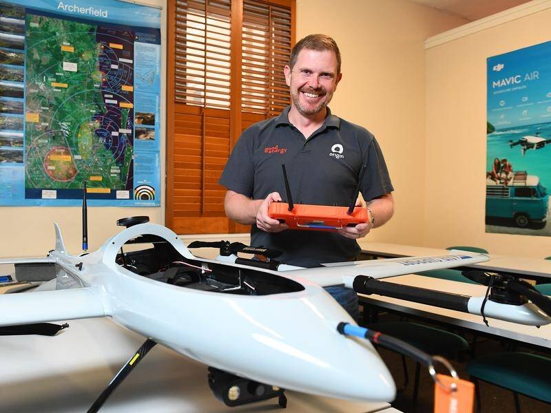 Barry Burke and other Origin Energy pilots use drones to help maintain Australia's energy network. (JONO SEARLE)