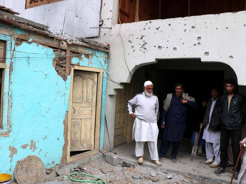 Pakistani officials say houses in Kashmir were damaged by shelling from Indian security forces.