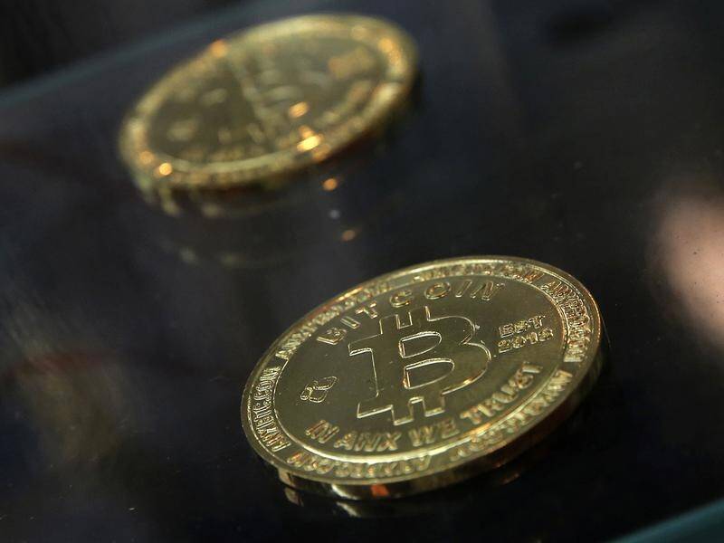 Cryptocurrencies were used to avoid detection of an elaborate cyber fraud syndicate, the AFP says.