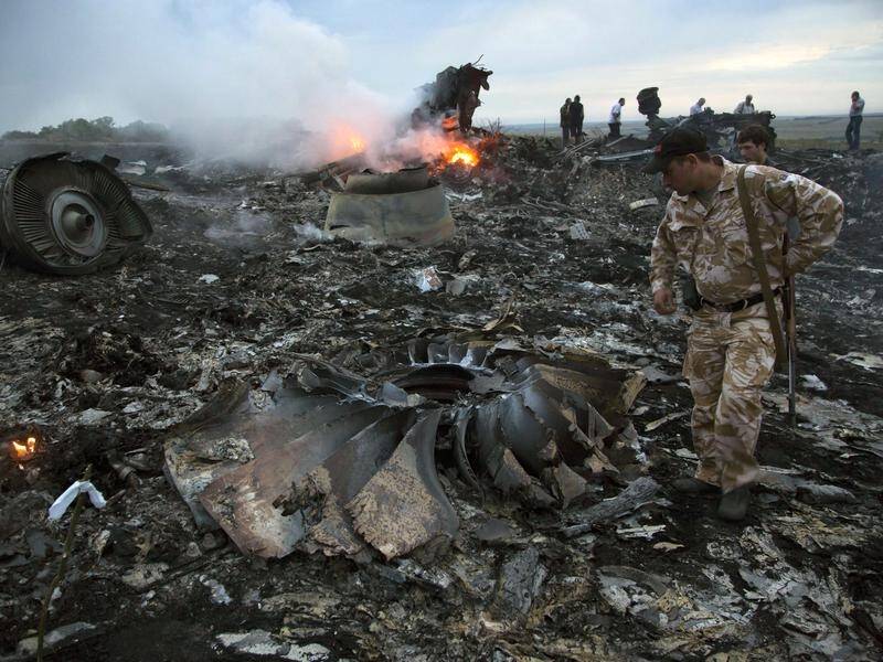 Russia has denied involvement in the MH17 attack, in which all 298 passengers and crew were killed. (AP PHOTO)