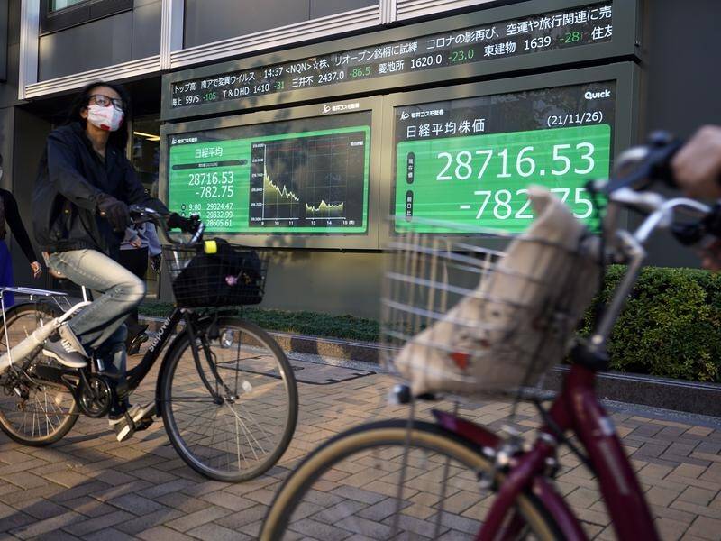 Japan's Nikkei eased 0.7 per cent, as the government considers raising its economic growth forecast.
