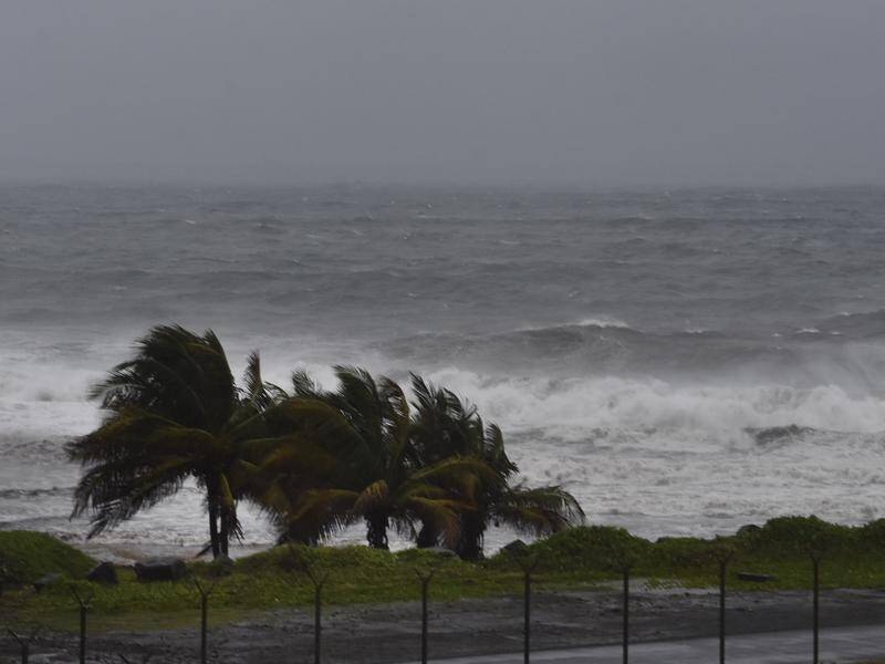 Tropical storm Elsa is no longer a hurricane but has battered Haiti.