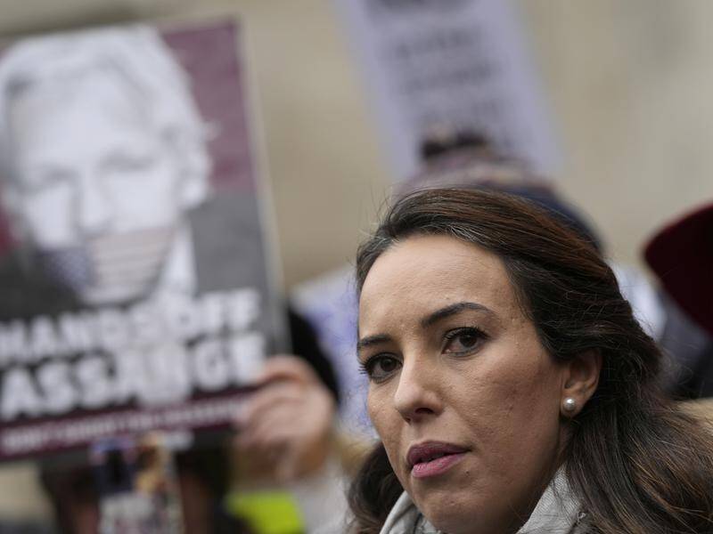 Stella Assange has concerns about Julian Assange's health after he tested positive for COVID-19. (AP PHOTO)