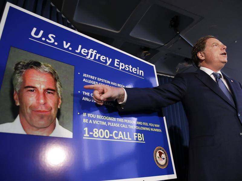 the US Justice Department says a psychologist approved Jeffrey Epstein's removal from suicide watch.