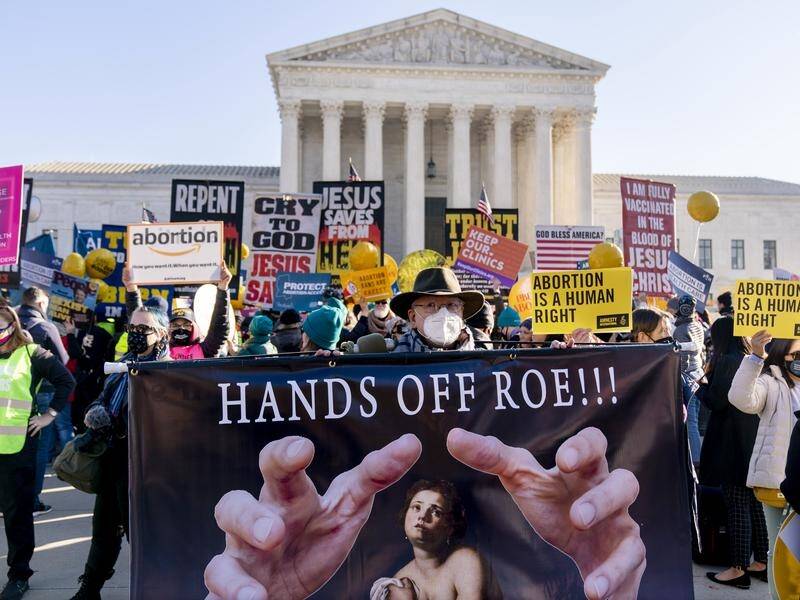 Abortion rights advocates and anti-abortion protesters demonstrate in front of the US Supreme Court.