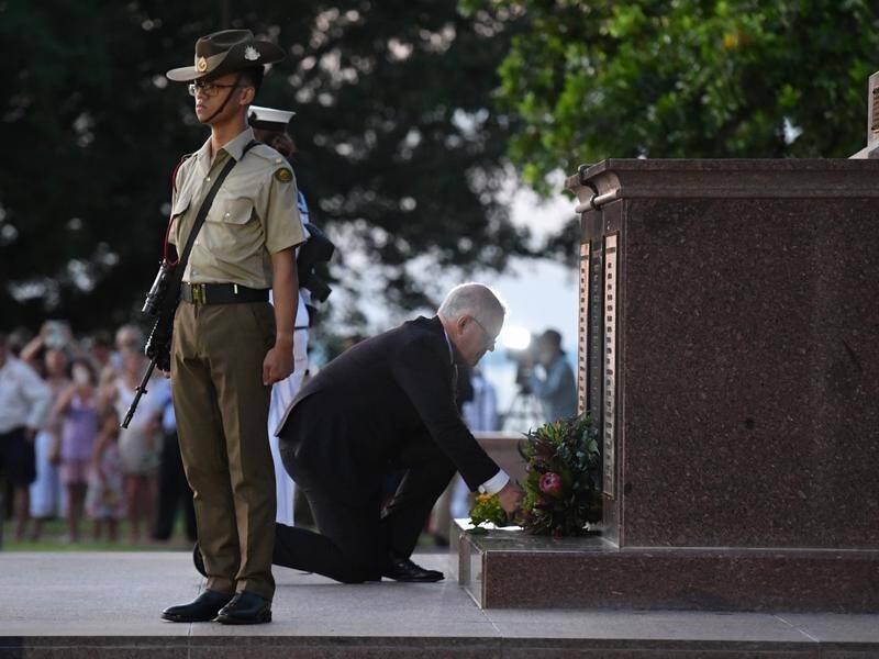 Prime Minister Scott Morrison lays a wreath at the dawn service at the Darwin Cenotaph.