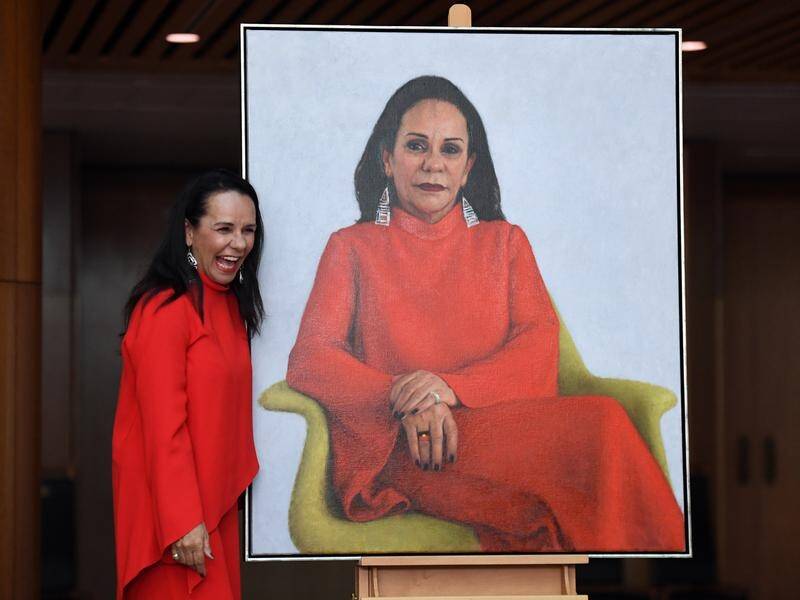 Linda Burney and her portrait, by Jude Rae, unveiled at Parliament House in February this year.