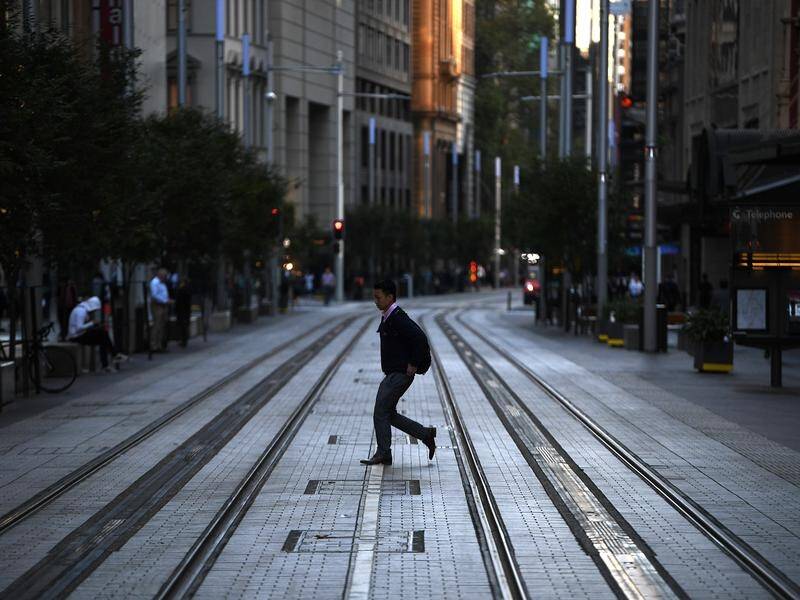 Sydney's streets are quiet and travel on public transport has fallen off steeply amid restrictions.
