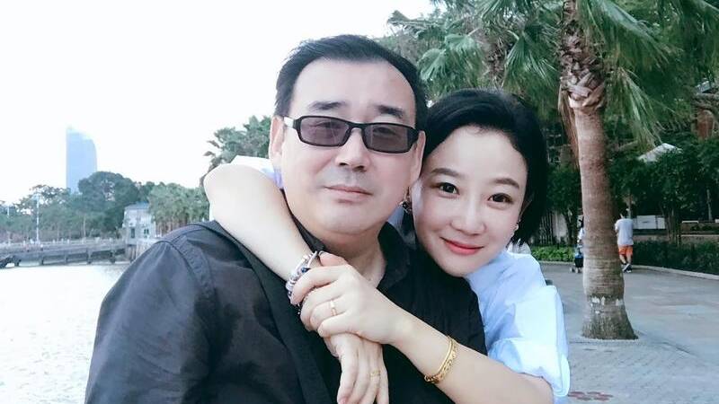 Writer Yang Hengjun (left, with wife Yuan Xiaoliang) has received a suspended death sentence. (AP PHOTO)