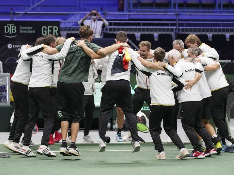 The German Davis Cup team celebrate booking their spot in the semis with victory over Great Britain.