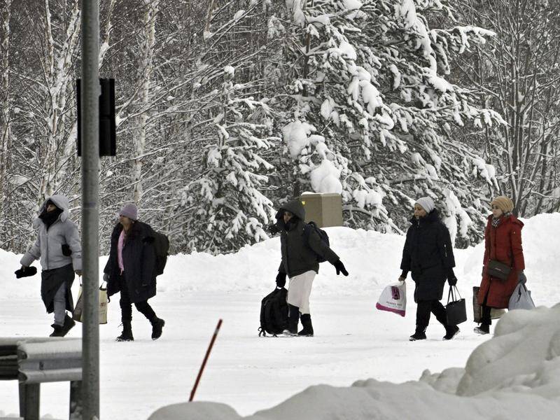 Migrants have continued to arrive at border check points as Finland prepares to shut some crossings. (AP PHOTO)