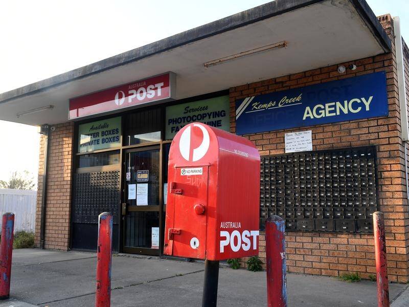 The postal workers' union says jobs are at risk under new changes.