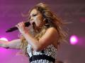 Singer Jennifer Lopez has cancelled her latest tour to spend time with her family. (AP PHOTO)