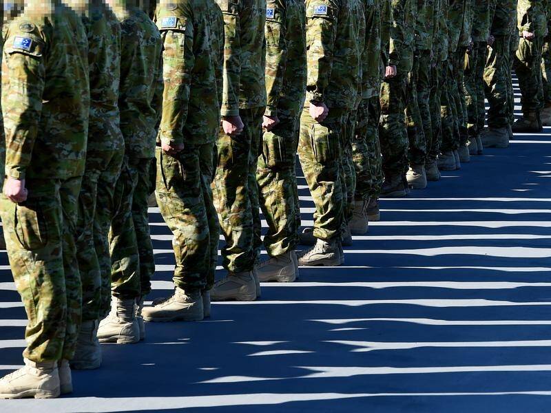 Some Australian Defence Force projects will be stripped back immediately to cut costs. (Dave Hunt/AAP PHOTOS)