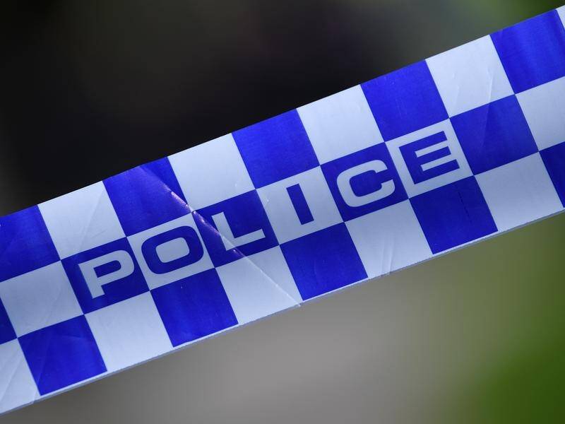Police found a seriously injured woman at a Swansea property and arrested a man at the scene.