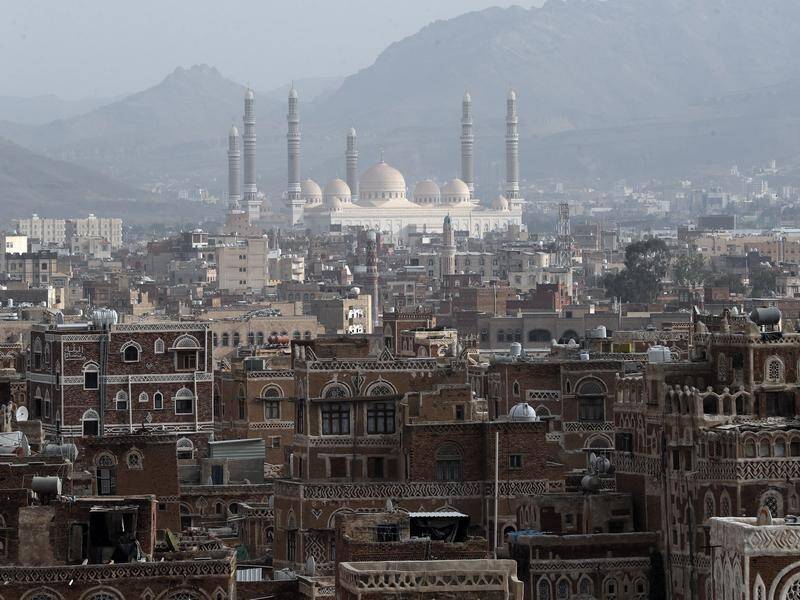 Saudi-led coalition strikes on Houthi targets in Yemen's capital Sanaa have killed 14 people.