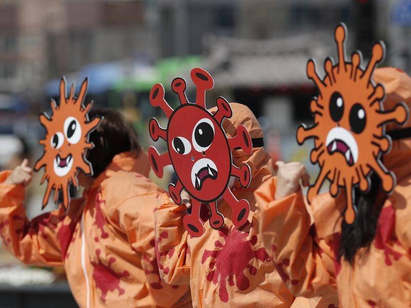 People perform in a coronavirus prevention campaign in Seoul, South Korea.