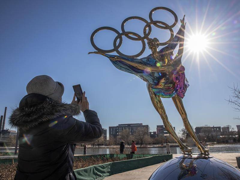 China slams Australia, the UK and the US for not sending officials to the Winter Olympics.