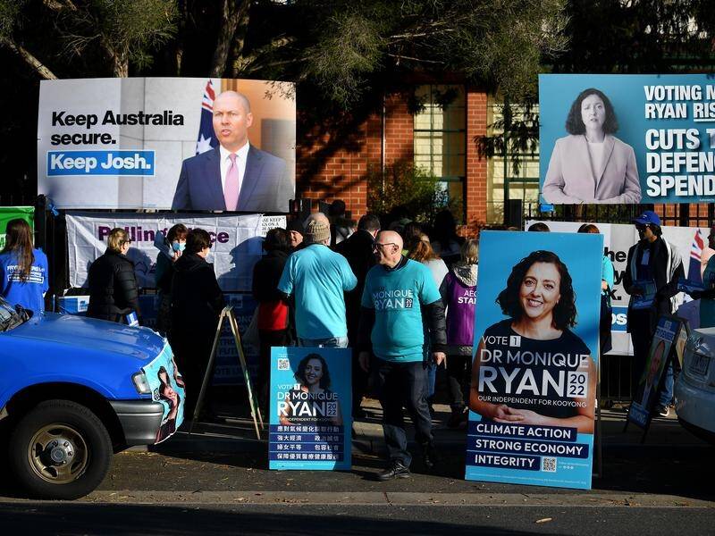 Animosity continued on election day between Kooyong candidates Josh Frydenberg and Monique Ryan.