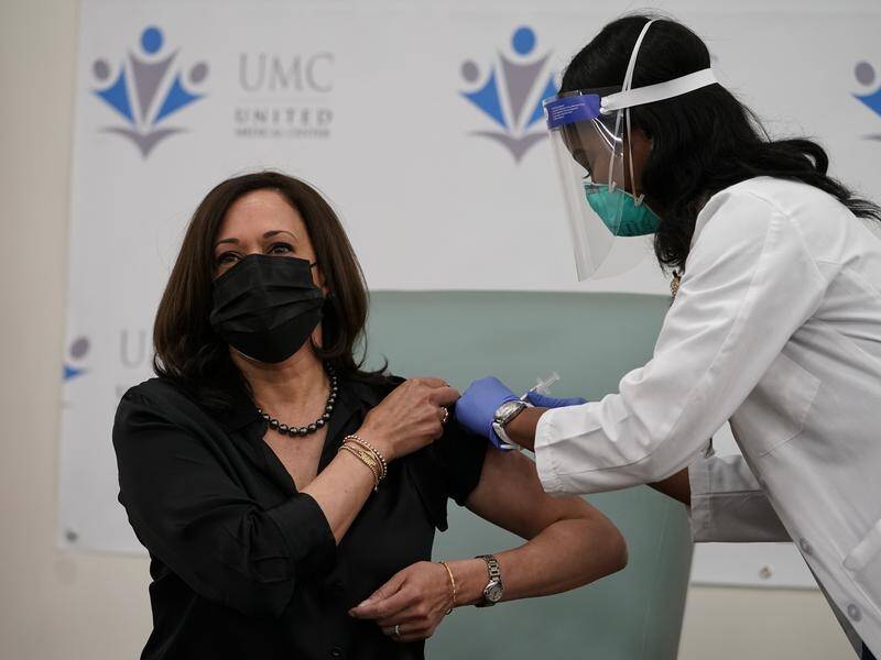 Kamala Harris receives her first dose of Moderna's COVID-19 vaccine.