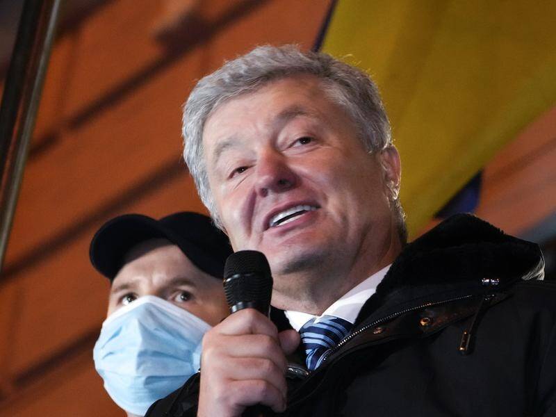 Former Ukrainian president Petro Poroshenko spoke to supporters after the court session.
