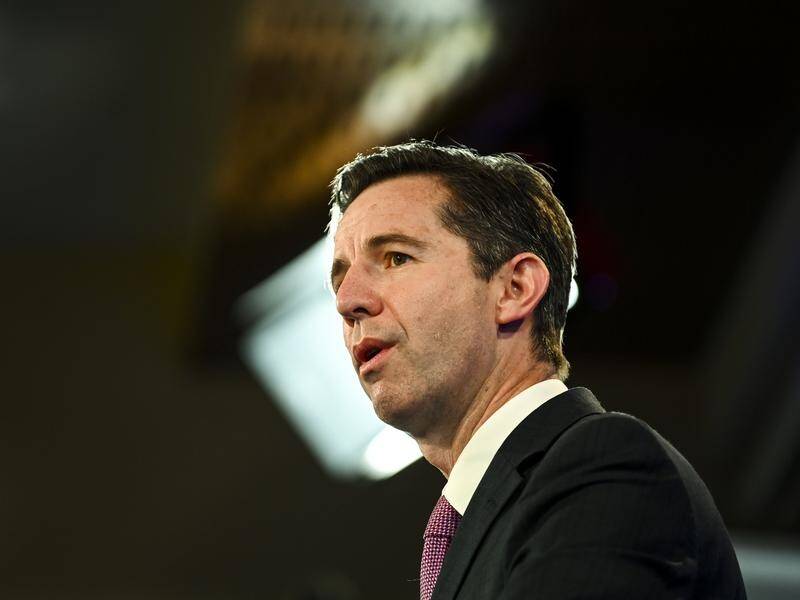 Simon Birmingham insists Australia has done nothing wrong by sheltering two journalists.