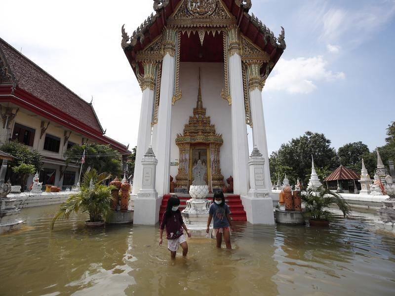 Temples in Thailand have been flooded following heavy rains.