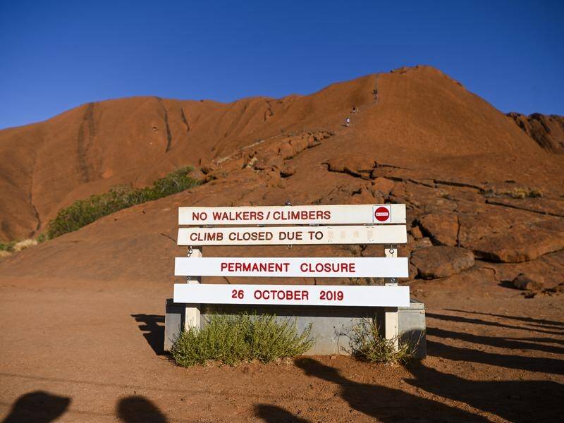 Climbing Uluru is now banned after the last people came down from the 348m-high monolith.