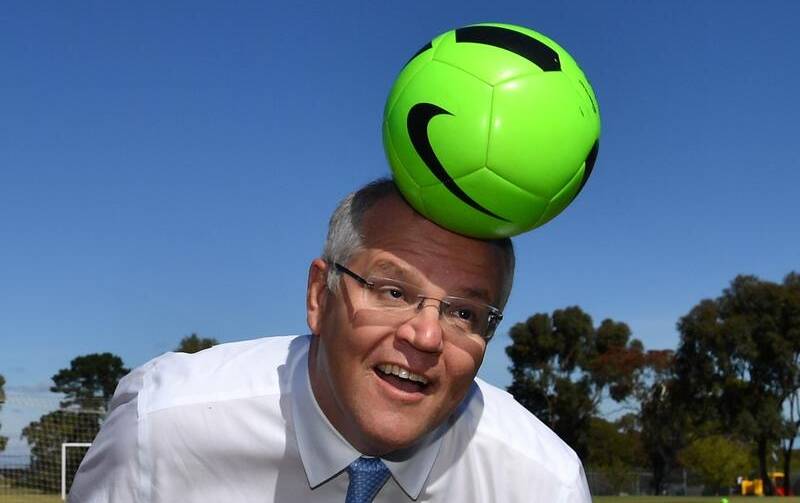 Prime Minister Scott Morrison heads a soccer ball near Adelaide during the campaign. Picture: AAP Image/Mick Tsikas
