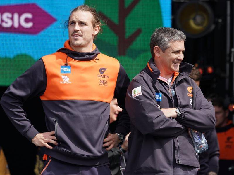 Phil Davis (L) passed a late fitness test and started for GWS in the grand final against Richmond.