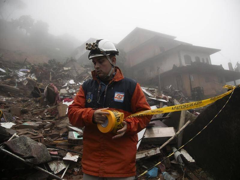 Rescue efforts were delayed in the Petropolis region because of the risks of new landslides. (AP PHOTO)