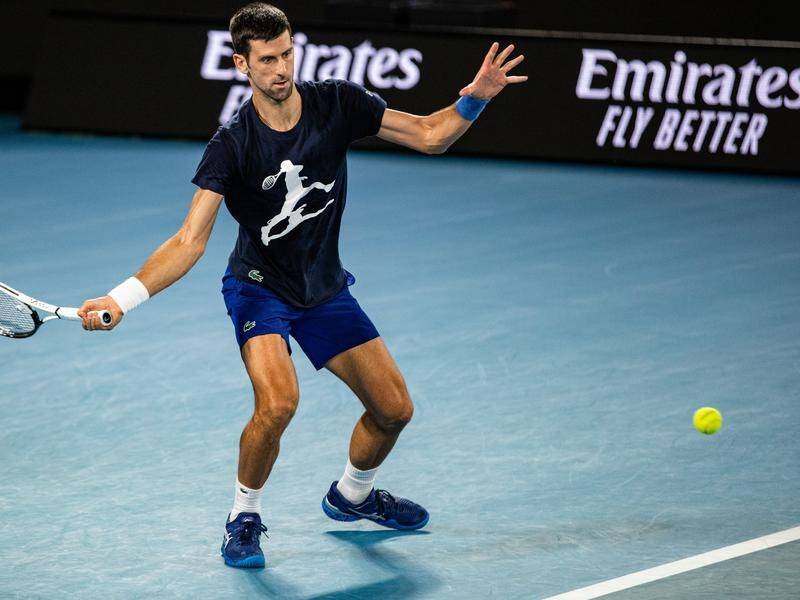 Novak Djokovic, here practising at Melbourne Park, is back in immigration detention.