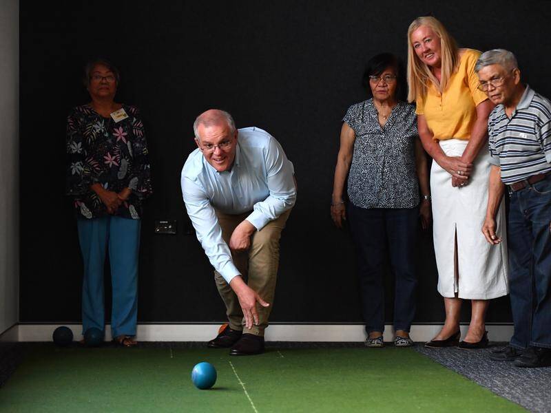 Prime Minister Scott Morrison has played carpet bowls in Darwin on day 37 of the election campaign.