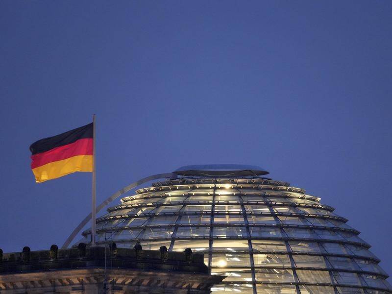 Germany's Greens are to announce the result of a members' vote on backing a three-way coalition