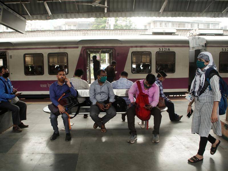 Trains have resumed service in Mumbai after a blackout stranded thousands of passengers.