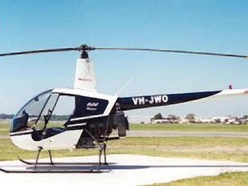 A pilot has been found dead in the wreckage of his Robinson R22 helicopter which crashed in the NT. (HANDOUT/PR)