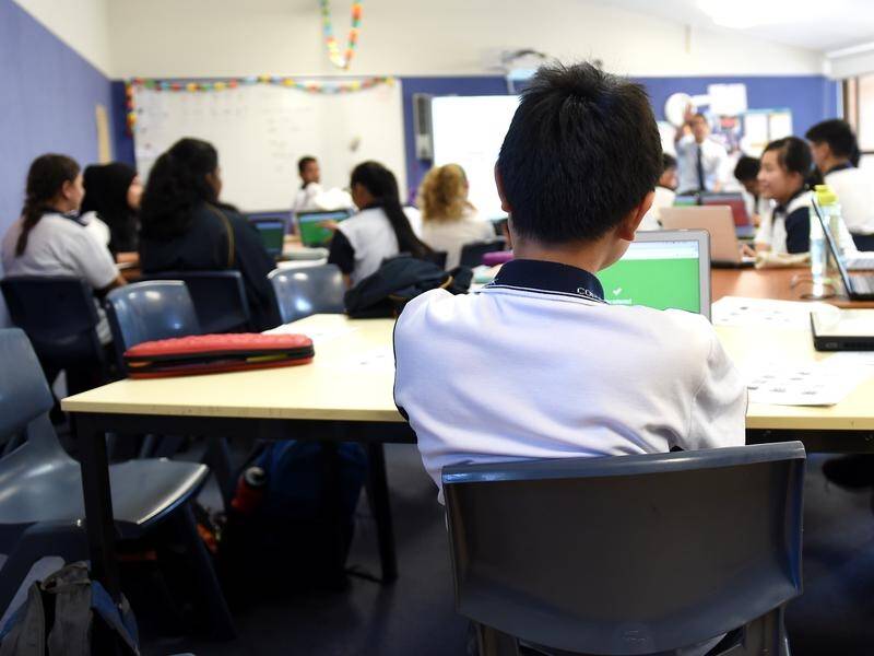 SA teachers are said to be working long hours with much extra time spent on administrative tasks. (Paul Miller/AAP PHOTOS)