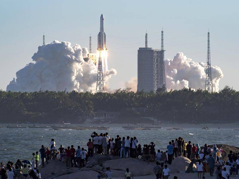 China's new large carrier rocket blasts off from the Wenchang Space Launch Centre on Tuesday.