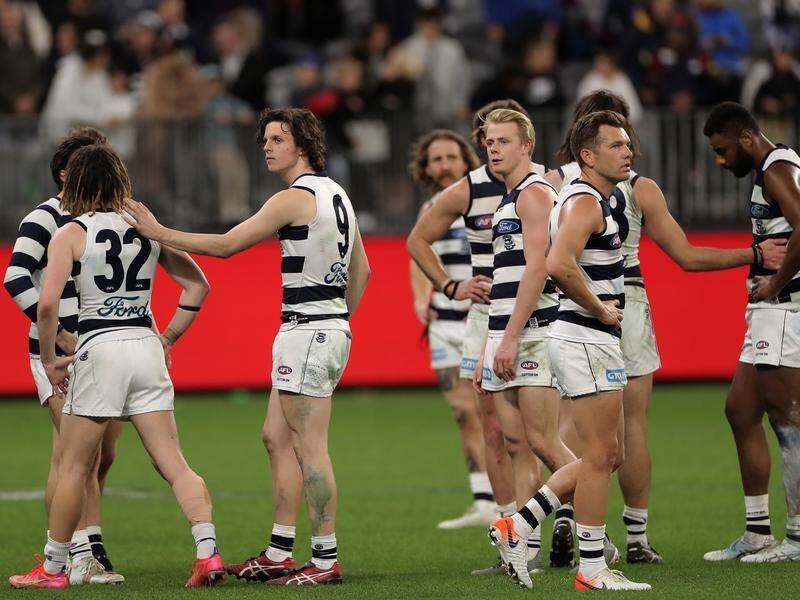 The Cats cut a dejected crew after losing the AFL preliminary final clash with Melbourne.