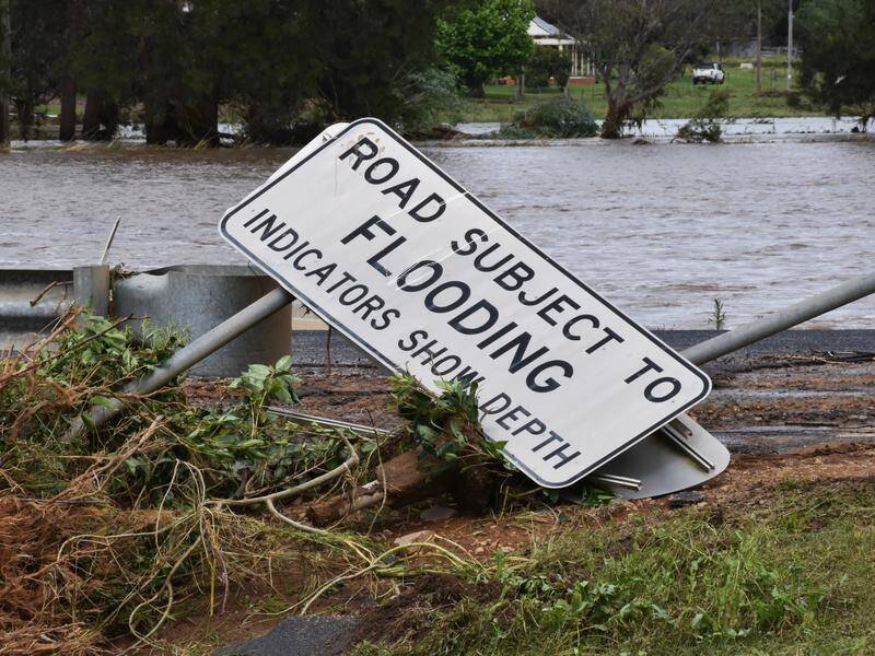 This year's floods and rains have caused large scale catastrophic damage to the road systems. (Murray McCloskey/AAP PHOTOS)