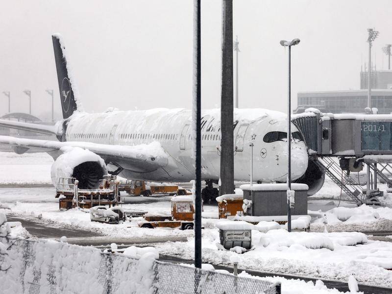A snowstorm southern Germany and parts of Austria and Switzerland affecting travel across the region (AP PHOTO)