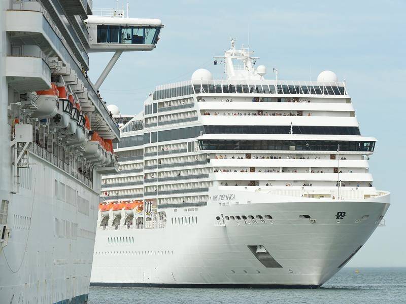 The MSC Magnifica cruise ship (R) denies anyone on board is ill as WA weighs allowing it to refuel.