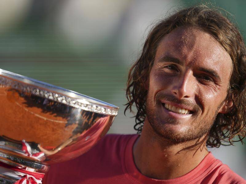 Stefanos Tsitsipas with the Monte Carlo Masters trophy after beating Casper Ruud in the final. (AP PHOTO)