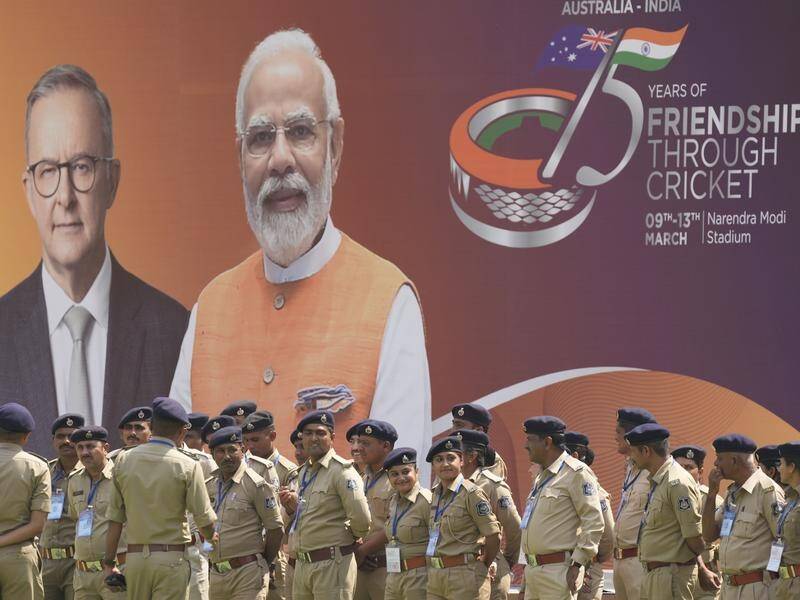 A hoarding featuring PMs Anthony Albanese and Narendra Modi at the Ahmedabad Test stadium. (AP PHOTO)