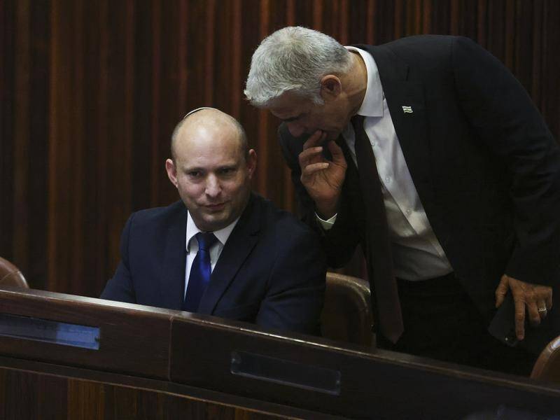 Naftali Bennett is expected to become the next Israeli PM, followed later by Yair Lapid.