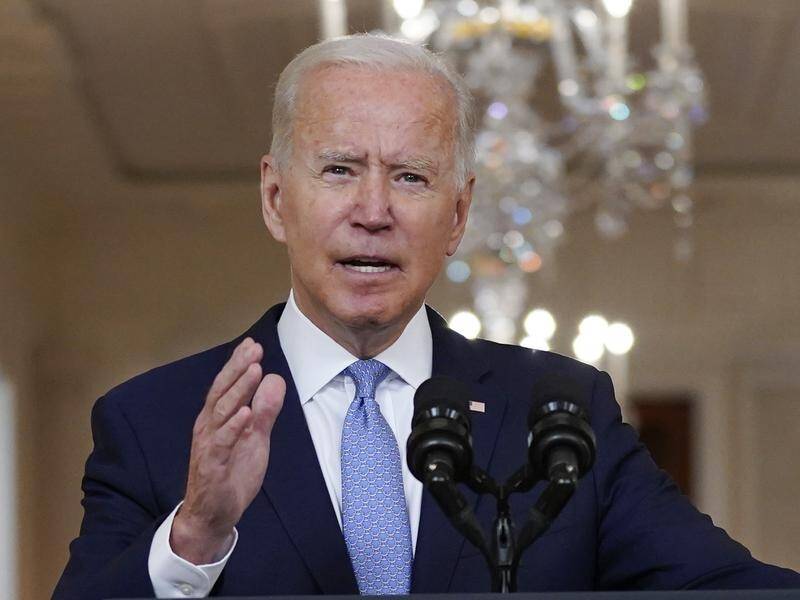 The real choice in Afghanistan was "between leaving or escalating", President Joe Biden says.