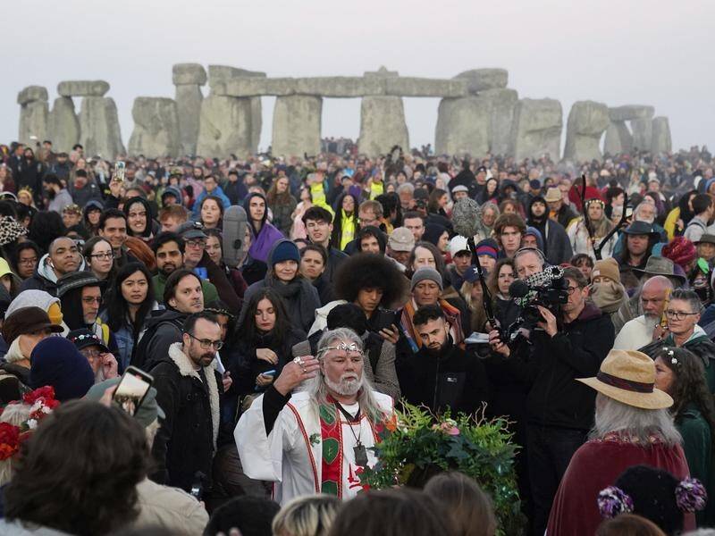 Thousands have gathered at Stonehenge to greet the sunrise and mark the summer solstice.