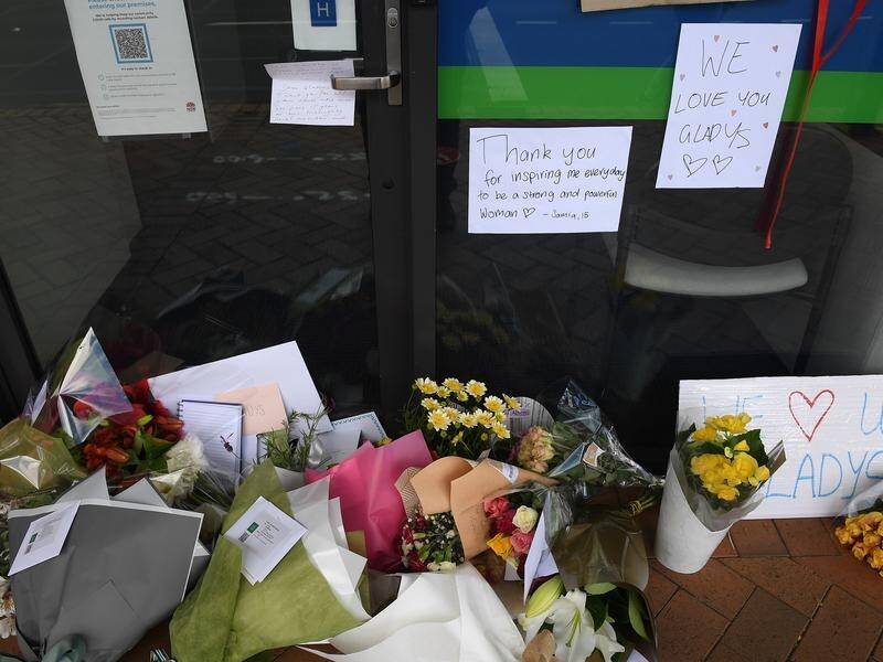 Flowers and thank you notes have been left outside the electoral office of Gladys Berejiklian.